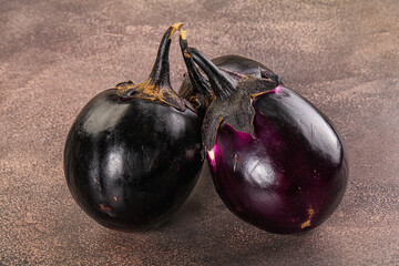 Raw violet and black eggplant