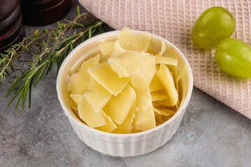 Parmesan cheese slices in the bowl