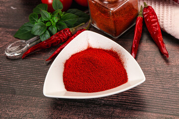 Spicy dry paprika powder in the bowl