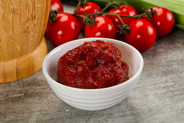 Red tomato paste in the bowl
