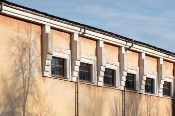 design and architectural solution of an apartment building, windows, facade, roof. light and shadow