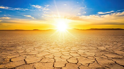 Obraz premium Vast Arid Desert Landscape with Bright Sun and Cracked Earth