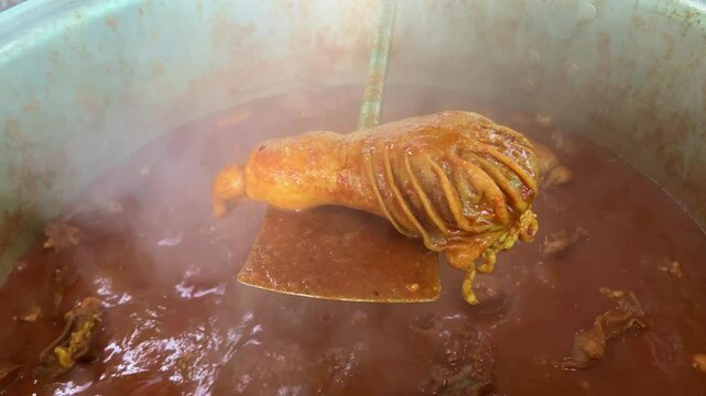 Mutton chusta cooked in traditional way in a road side stall in Jharkhand