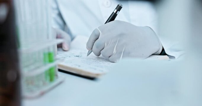 Hand, writing notes and scientist in laboratory for experiment, test or project report. Pen, career and closeup of microbiologist working on pharmaceutical innovation with form, paperwork or document