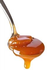 Close-up of a spoonful of thick, golden honey dripping down, highlighting its rich texture and shine.