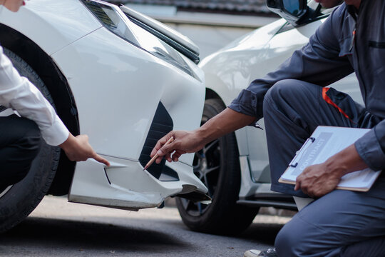 The young man's car insurance came to see and assess the damage and gave advice to the young woman who owned the car and then peed on the damaged spot.