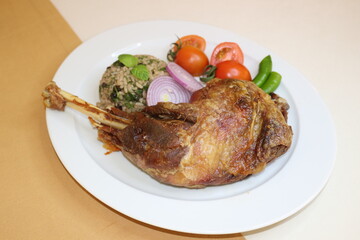 Cooked turkey, rice, nuts and oak plate prepared for Christmas 2024
