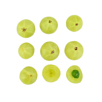 Fresh amla (Indian gooseberry) fruits with cut in half levitate isolated on transparen png.