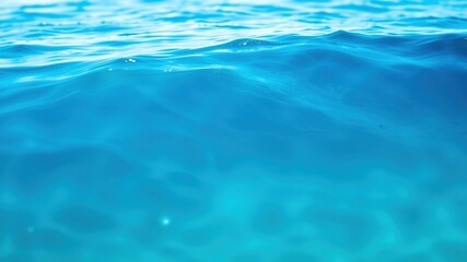 A captivating underwater scene showcasing the mesmerizing turquoise depths and gentle undulation of ocean waves.