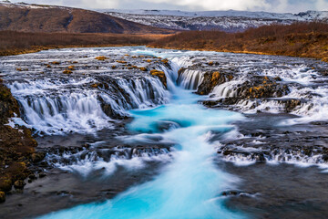 Beautiful turquoise Bruarfoss Waterfall in the autumn, Iceland