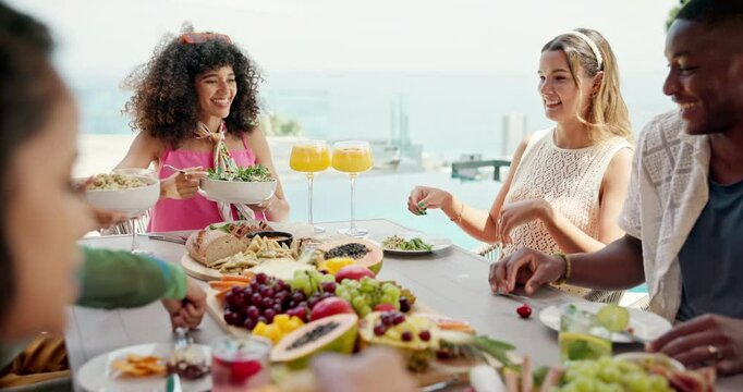 Helping, food and summer with friends and lunch on patio for vacation, bonding and reunion. Community, diversity and celebration with group of people and outdoors for fruits, nutrition or brunch