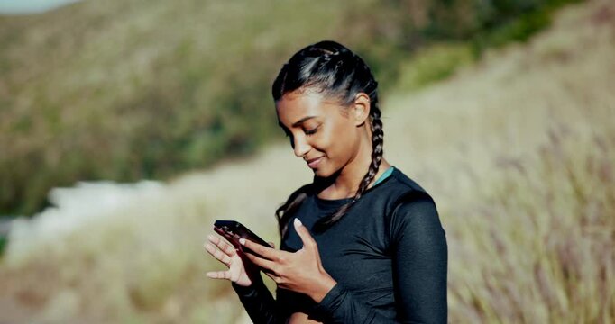 Phone, reading and runner with woman in nature for fitness app, tracking goals and marathon training. Online, workout progress and exercise with person in outdoor for wellness and networking