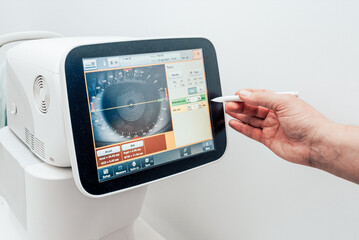 Patient checkup ophthalmologist, medical equipment checking vision, close up eye