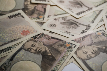 A collection of close-up photos of the Japanese 10,000 Yen banknote