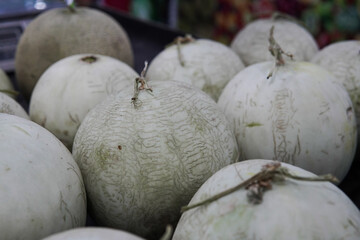 Whole melons sold in fruit shops are suitable for design purposes, as illustrations for articles about fruits and others.