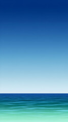 Obraz premium A serene ocean view with a clear blue sky and calm waters.