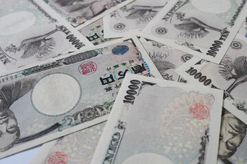 A collection of close-up photos of the Japanese 10,000 Yen banknote