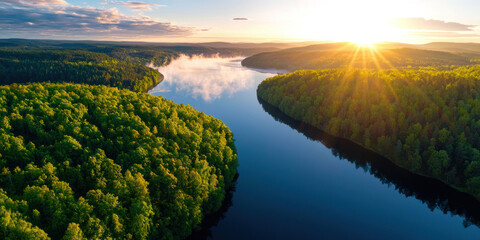 Obraz premium serene lakeside scene with lush trees and glowing sunrise, reflecting on calm waters