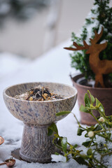 Incense ritual in winter on the terrace – burning resins and herbs on glowing charcoal. Shot...