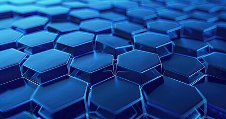 Obraz premium A close-up view of interconnected hexagonal shapes in a blue, glossy finish.