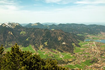 Obraz premium View from the Wallberg to Lake Tegernsee and Gmund. A town on a beautiful lake under the mountains.