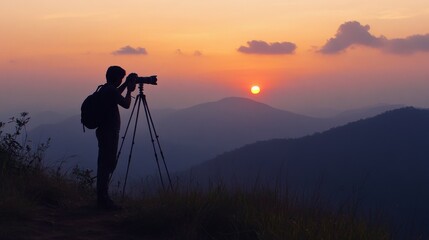 A photographer silhouetted against a dramatic sunset sets up a tripod to capture the beauty of a mountainous landscape. The sky glows with warm colors, creating a tranquil scene.. AI Generation