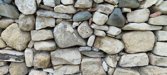 Stone wall photo, textured background.