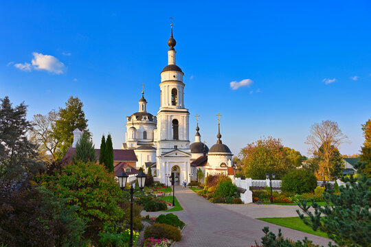 Autumn garden of the St. Nicholas Chernoostrovsky Monastery at sunset