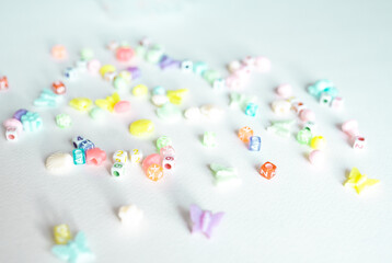 Beads set for children hobby. Kids beads to create jewelry with copy space.