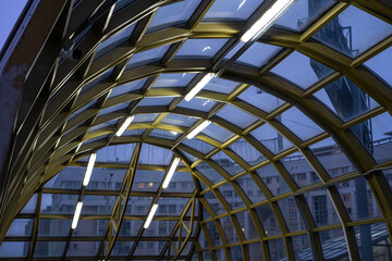 The underpass is illuminated in the evening