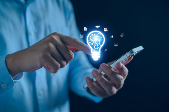 Business solution idea concept. Businessman  creative light bulbs with marketing network, planning strategy, analysis and development, modern technology, Innovative of new idea