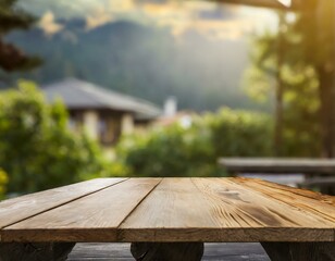 Fototapeta premium A wooden table surface in the foreground with an outdoor setting in soft focus. The background includes blurred greenery, sunlight, and outdoor furniture, creating a warm and serene atmosphere.