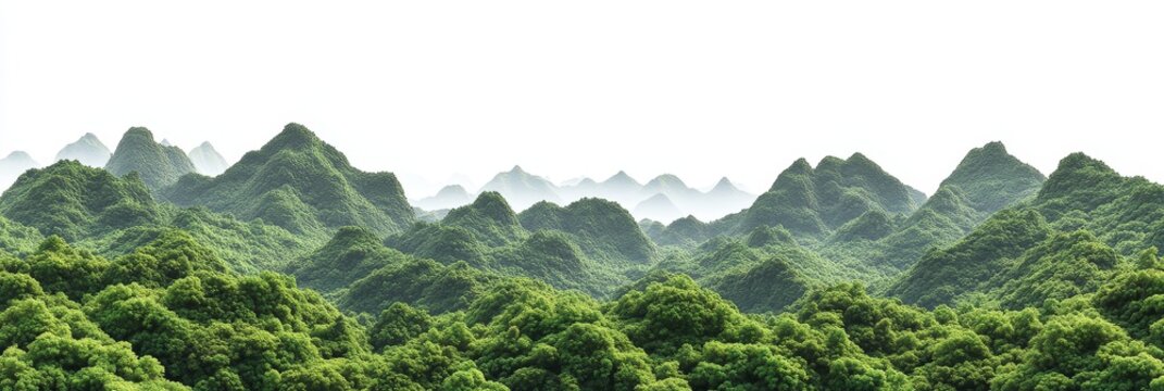 Lush green mountains and rolling hills under a hazy sky.