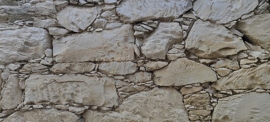 Stone wall photo, textured background.