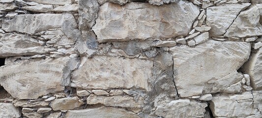 Stone wall photo, textured background.