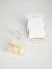 aromatic coconut wax in cubes for use as sachets or in aromatherapy. Photo on a white background