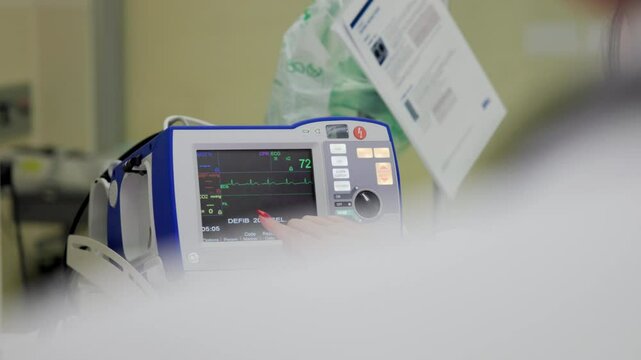 Doctor monitors vital signs