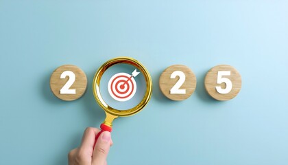 Happy new year 2025 with business concept. 2025 year number with Target icon inside the golden magnifying glass on light blue background. Planning for goal and success concepts. New Year resolution
