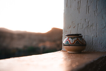 ashtray during sunrise on a balcony