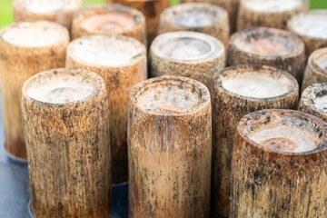 Naklejka premium Close-Up of Rustic Wooden Logs