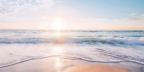 Beautiful beach scene showcasing soft rolling waves and a bright clear sky, ideal for a calming getaway