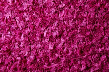 Vibrant magenta texture showcasing intricate patterns and depth for creative design and inspiration