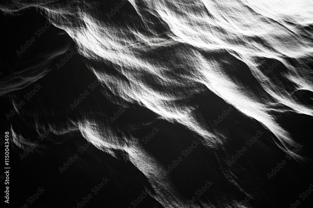 Poster soft shadows dance across a textured surface, creating contrasting patterns of light and dark