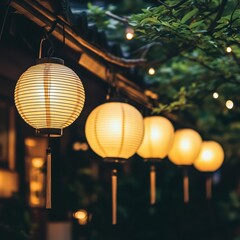 Obraz premium Elegant Japanese Paper Lanterns Illuminating a Nighttime Garden Scene
