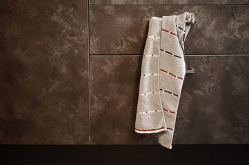 towel hanging on a cupboard