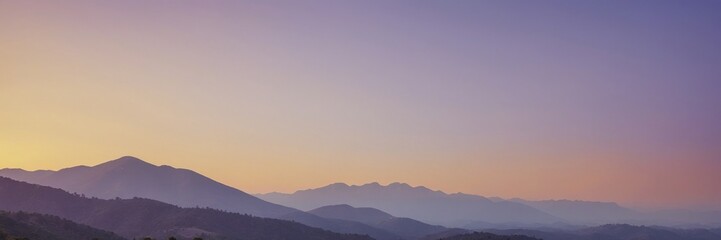 Dreamy Pink and Purple Mountain Sunset Wallpaper Banner Background
