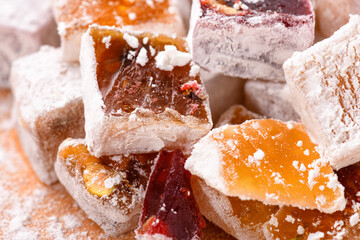 Sweet food Turkish delight, assorted rahat locum in form of cubes with nuts and powdered sugar, traditional food
