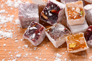 Sweet food Turkish delight, assorted rahat locum in form of cubes with nuts and powdered sugar, traditional food