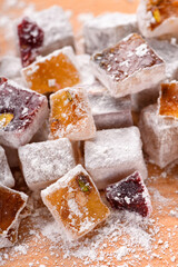 Sweet food Turkish delight, assorted rahat locum in form of cubes with nuts and powdered sugar, traditional food