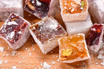 Sweet food Turkish delight, assorted rahat locum in form of cubes with nuts and powdered sugar, traditional food